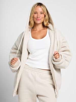 Weighted Hoodie: Breiana is 5'7" and wears a size M