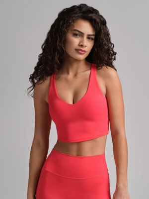 ComfrtCore™ V-Neck Crop Tank: Izabella is 5'5" and wears a size XS