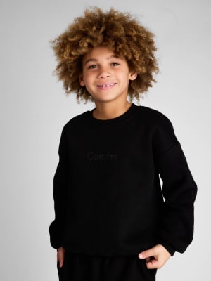 Signature Kids Crew: Logan is 8 wearing a size S