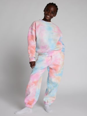 Minimalist Kids Sweatpants: Hattie is 6 wearing a size S