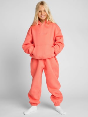 Signature Kids Sweatpants: Arina is 9 wearing a size S