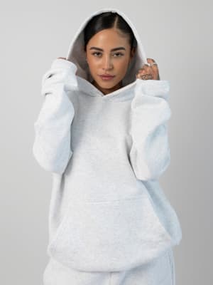 Signature Hoodie: Valen is 5′5″ wearing a size M
