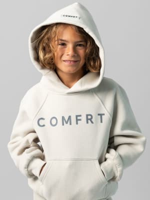 Tranquil Kids Hoodie: Jaydn is 7 wearing a size S