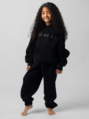 Tranquil Kids Sweatpants: Malu is 5 wearing a size S