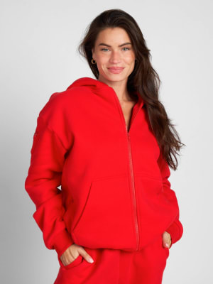 Travel Essentials Zip Hoodie: Lauren is 5'8" and wears a size M
