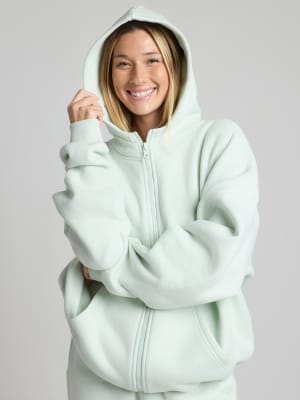Cloud Zip Hoodie: Kiara is 5’6” and wears a size S