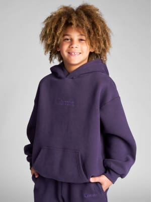 Signature Kids Hoodie: Logan is 8 wearing a size S