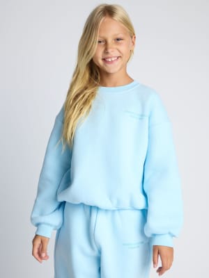 Pastel Kids Crew: Arina is 9 wearing a size S