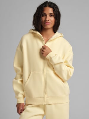 Basic Crop Zip Hoodie: Elly is 5'8” and wears a size S
