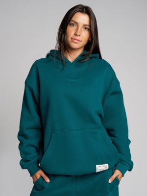 Affirmation Hoodie: Abby is 5′9″ wearing a size M