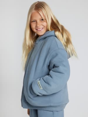 Weighted Kids Hoodie: Arina is 6 wearing a size XS