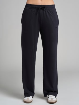 AllDayJersey™ Straight Leg Pants: Tyler is 5'9" and wears a size S