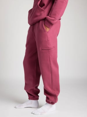 Airplane Mode Travel Sweatpants: Evan is 6'4" wearing a size M