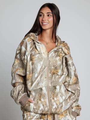 Camo Zip Hoodie: Sara is 5'6" and wears a size M