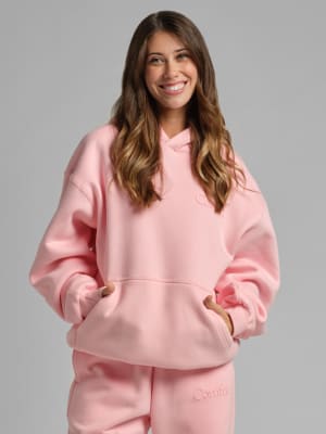 Minimalist Hoodie: Nikki is 5'8” and wears a size S