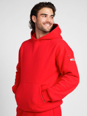 Travel Essentials Hoodie: Hunter is 6'2" and wears a size L