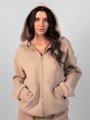 Travel Essentials Zip Hoodie: Abby is 5'9" and wears a size M