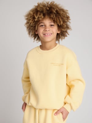 Pastel Kids Crew: Logan is 8 wearing a size S