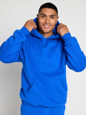 Minimalist Hoodie: Justin is 6’2” and wears a size L