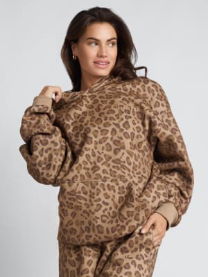 Minimalist Hoodie: Lauren is 5′8″ wearing a size M