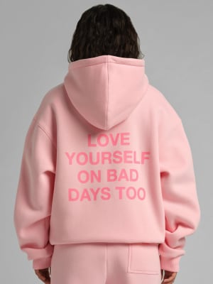 Comfrt x We're Not Really Strangers Hoodie: Elly is 5'8” and wears a size S