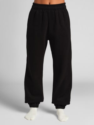 Comfrt x We're Not Really Strangers Sweatpants: Elly is 5'8” and wears a size S