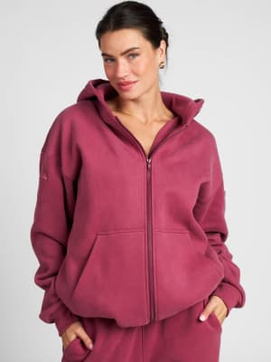 Travel Essentials Zip Hoodie: Lauren is 5'8" and wears a size M