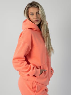Signature Hoodie: Harley is 5β²10β³ wearing a size M