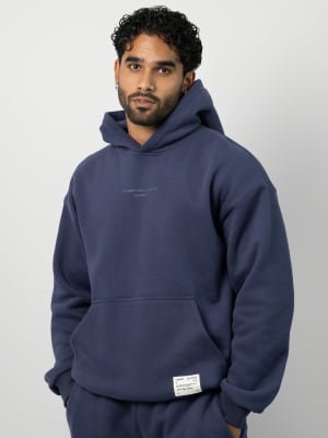 Affirmation Hoodie: Jared is 6′1″ wearing a size M