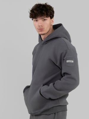 Travel Essentials Hoodie: Christian is 6′2″ and wears a size L